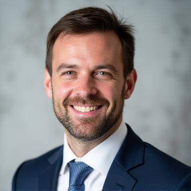 Professional headshot of Marcus Stone.